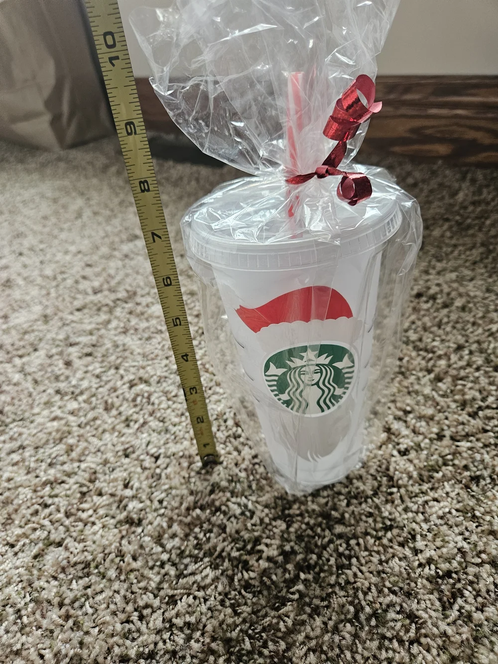 Starbucks White Tumbler with Red Santa Hat and Green Logo