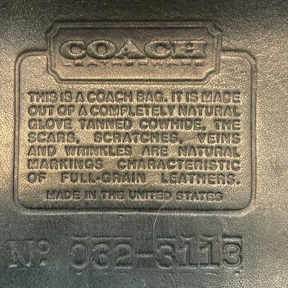 Coach too zipper
