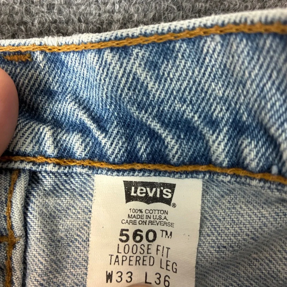 Vintage Levis 560 Loose Fit Tapered Leg Jeans Light Wash Made in USA Mens 33x36