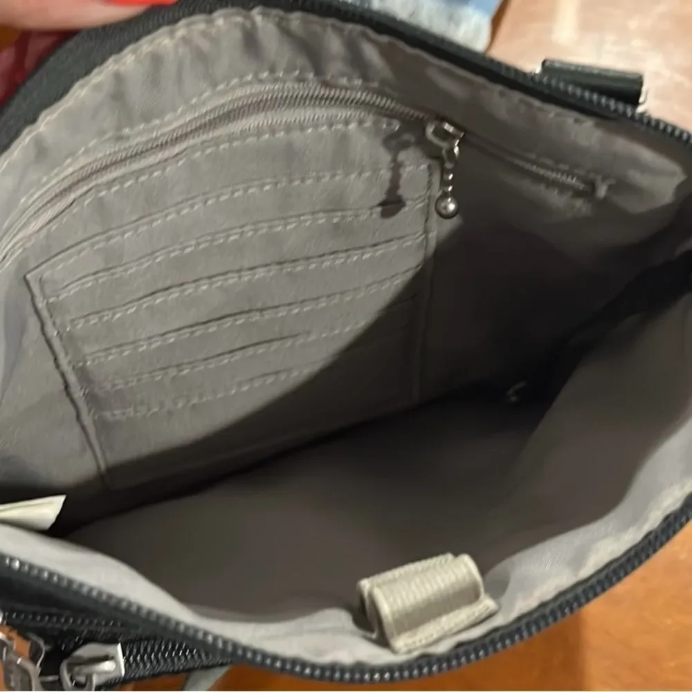 Baggallini gray and black crossbody bag with adjustable straps