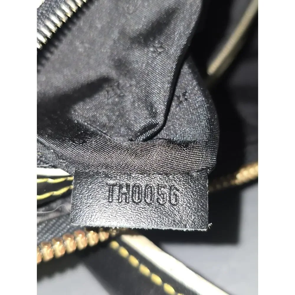 Black leather Louis Vuitton locKit bag
