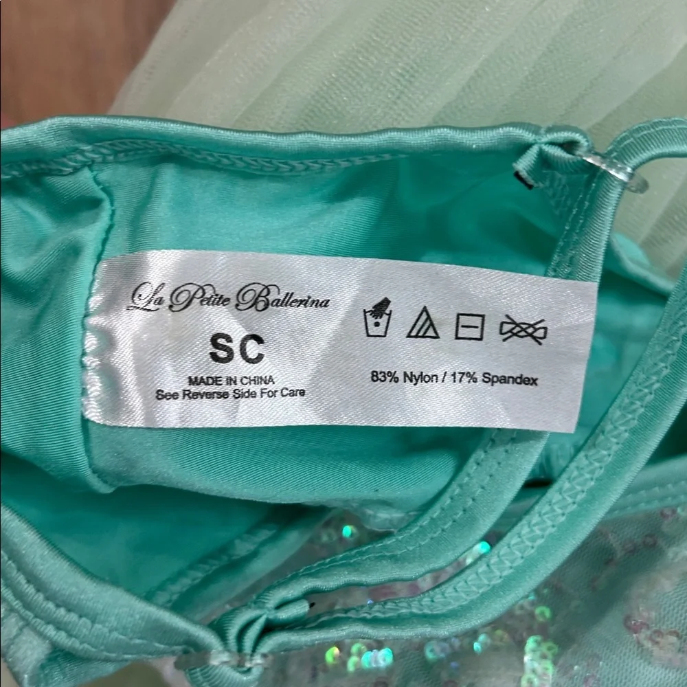 La Petite Ballerina costume size SC beautiful turquoise & green sequined w/bow