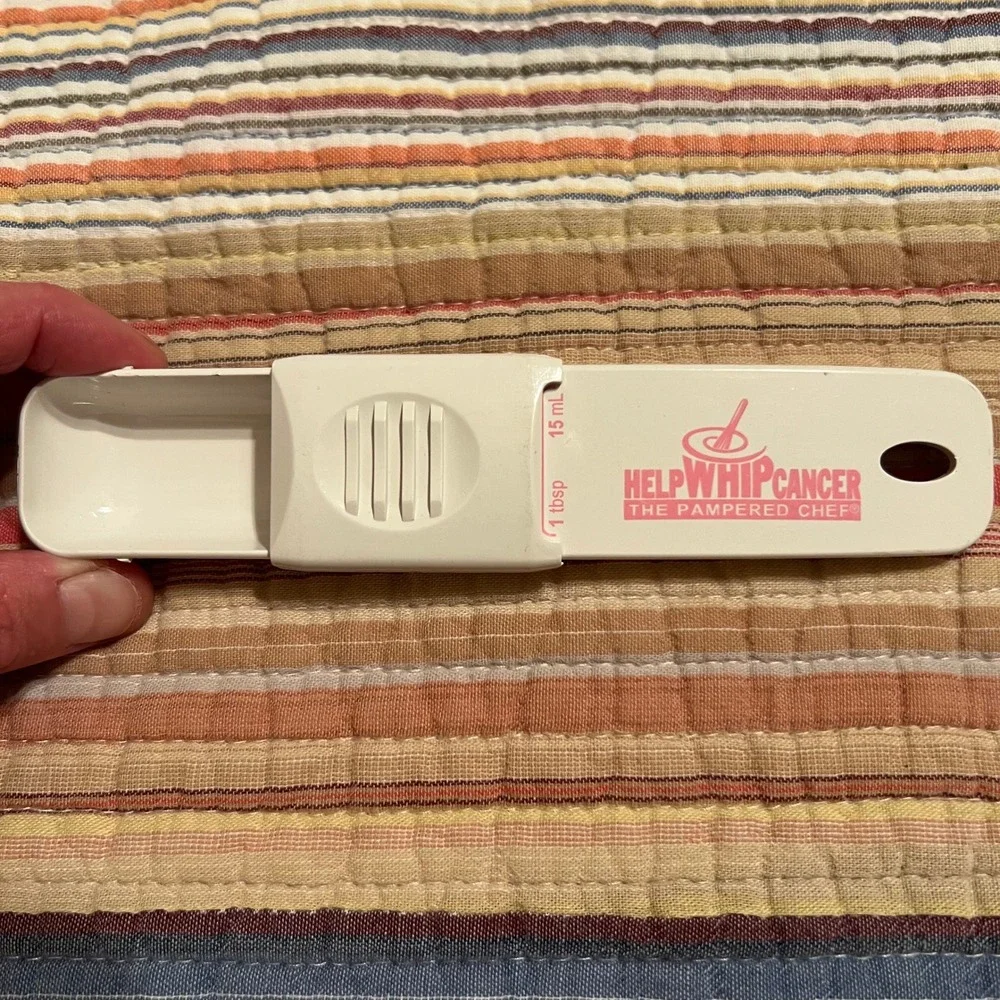 The Pampered Chef adjustable measuring