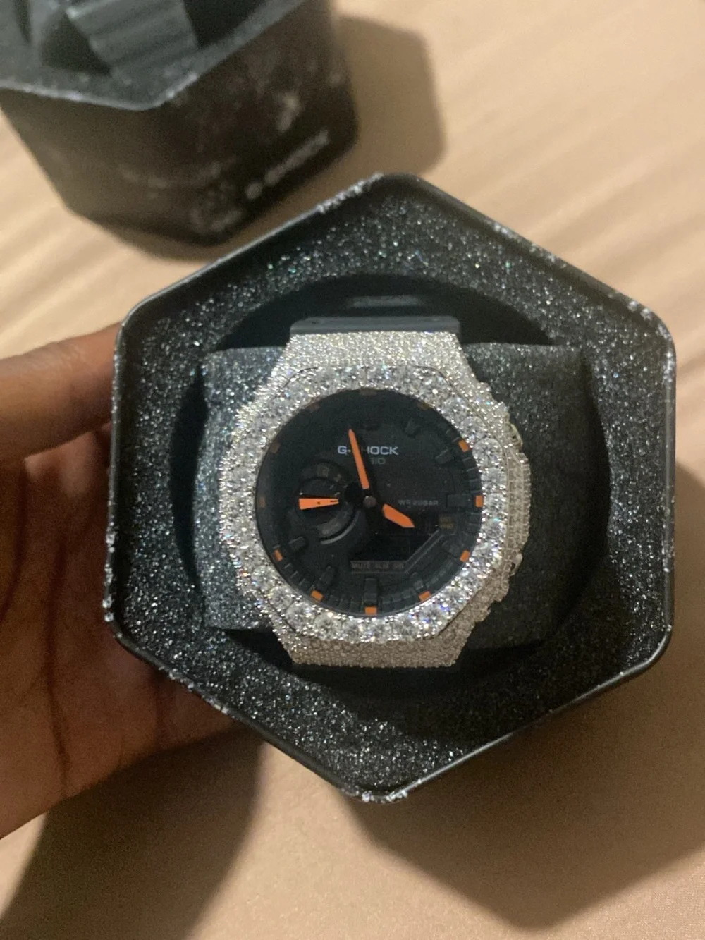 G-Shock Black Dial with Orange Accents and Silver Glitter Bezel