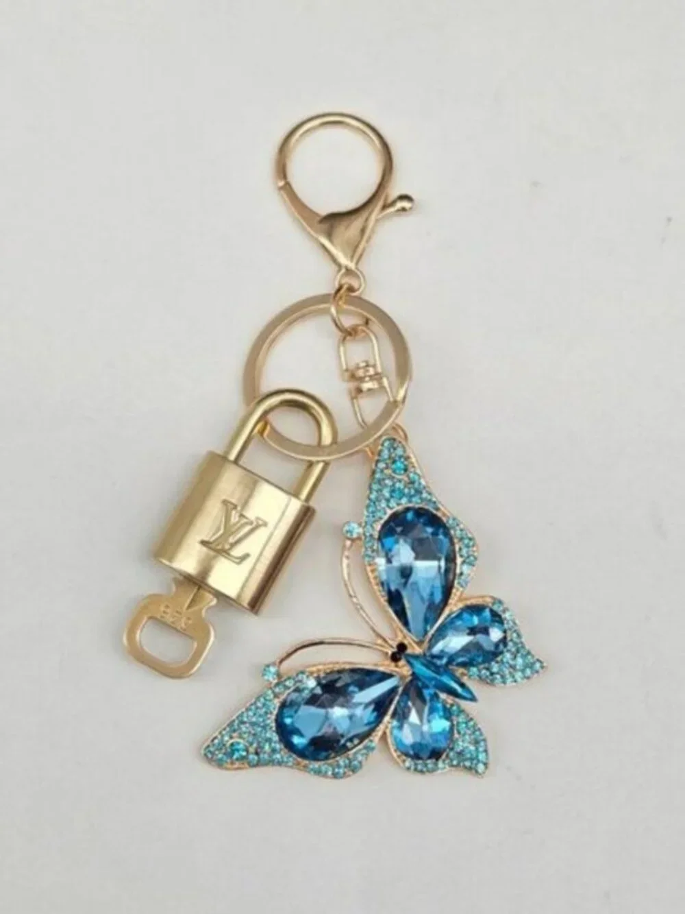 LV Authentic Gold Lock & Key 🔑 Luxury Bag Charm w/ Unbranded Butterfly Keychain