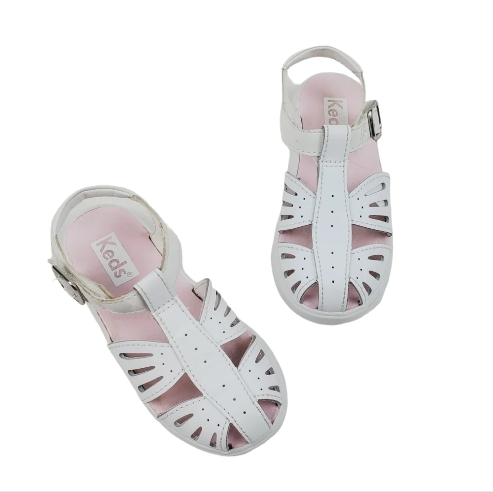 Keds kids caged
