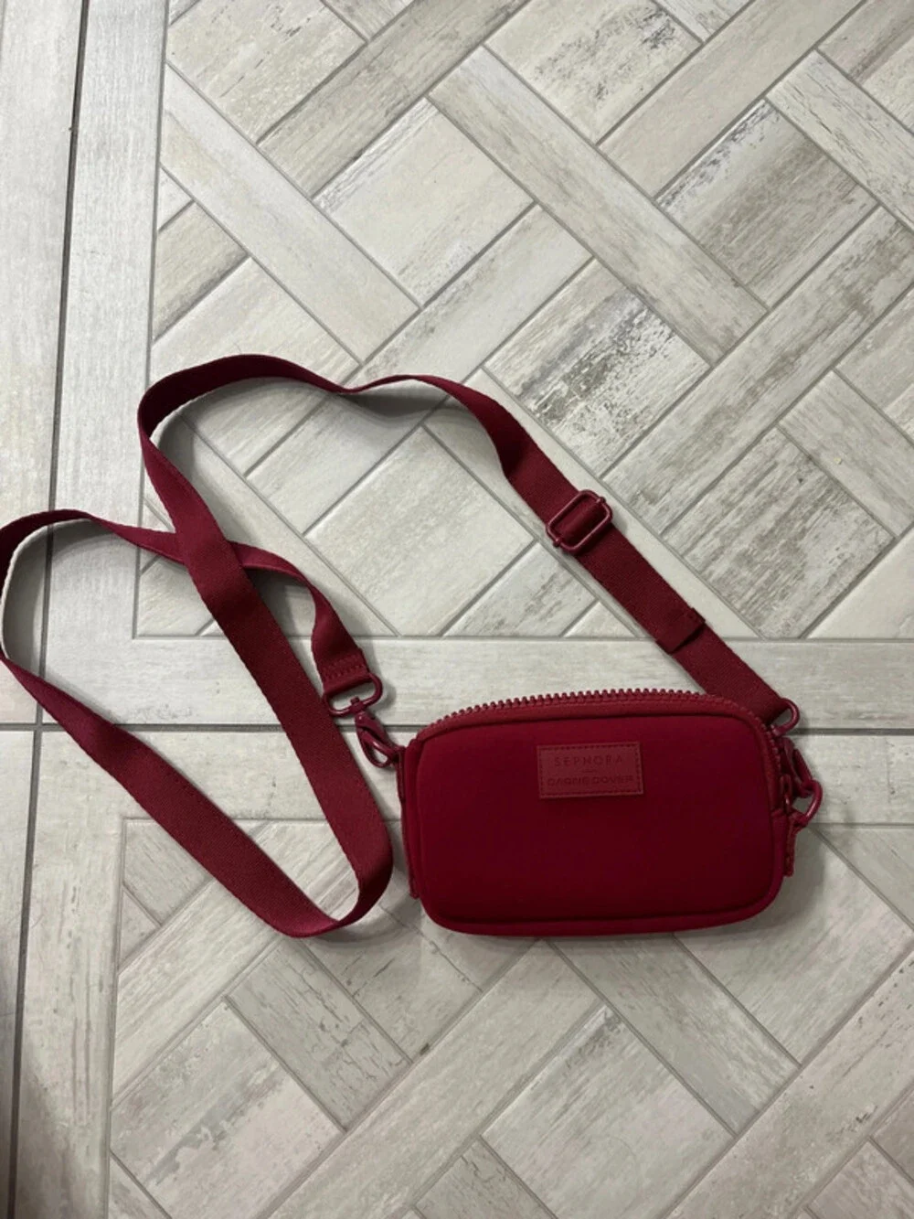 Dagne Dover Sephora colab bag. Burgundy crossbody with long strap brand new cond