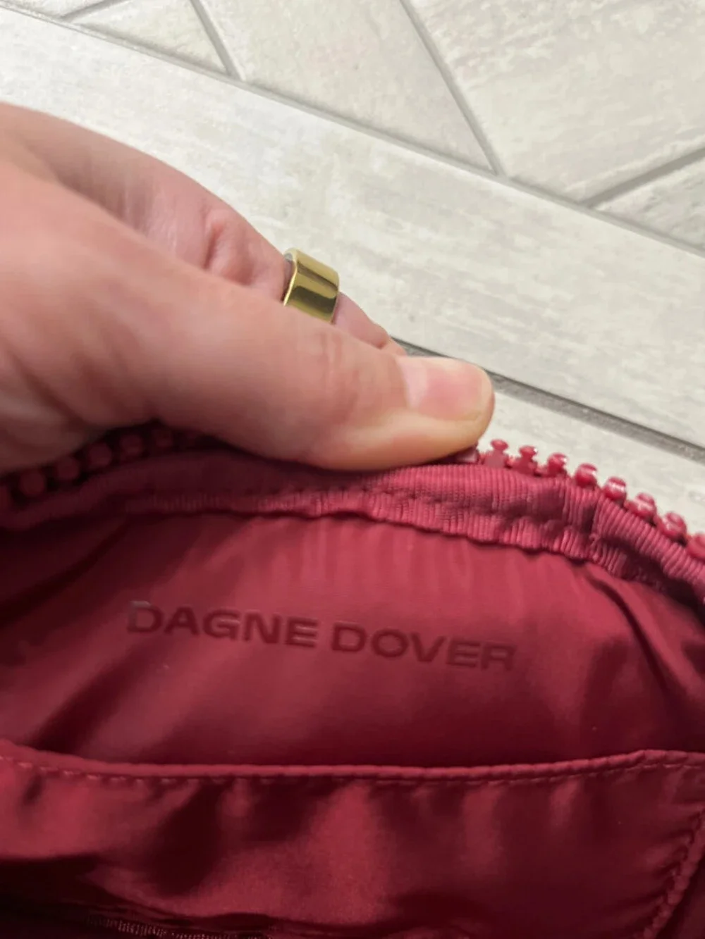 Dagne Dover Sephora colab bag. Burgundy crossbody with long strap brand new cond