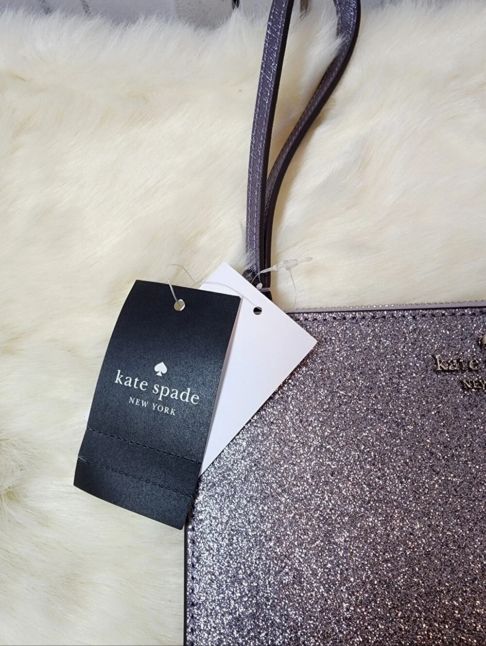 Kate Spade Lucy Silver Glitter Wristlet.