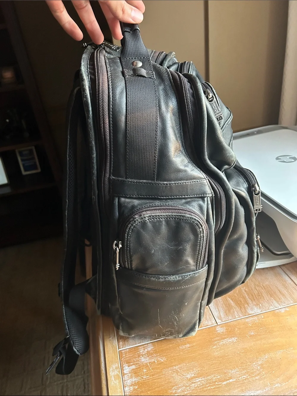 Tumi Black Leather Multi-Compartment Backpack
