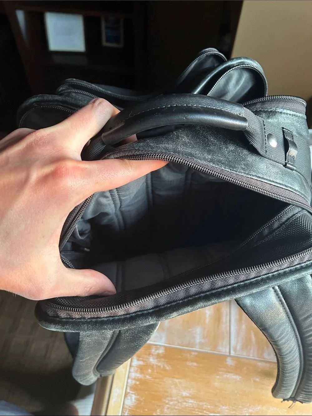 Tumi Black Leather Multi-Compartment Backpack
