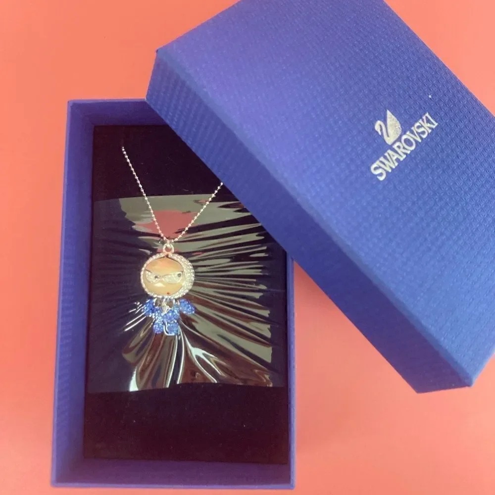 Swarovski Eliot Swing Sing Bow Tie Blue Pendant Necklace