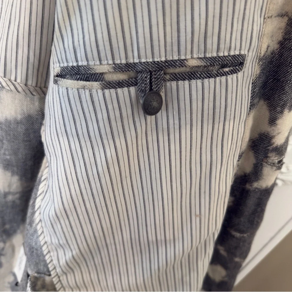 John Varvatos lapel button
