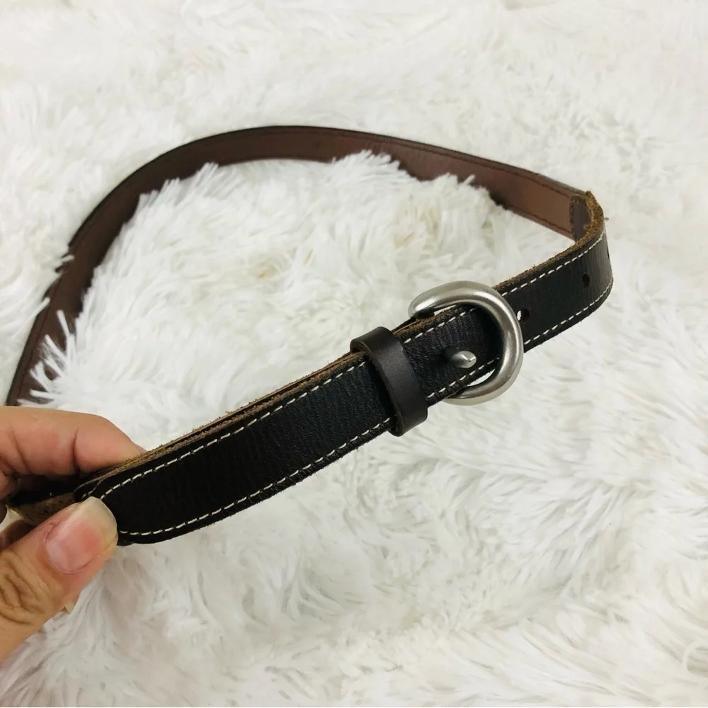 Colorful woven and brown leather belt 36.5” long. Cute and trendy! 90’s vintage!