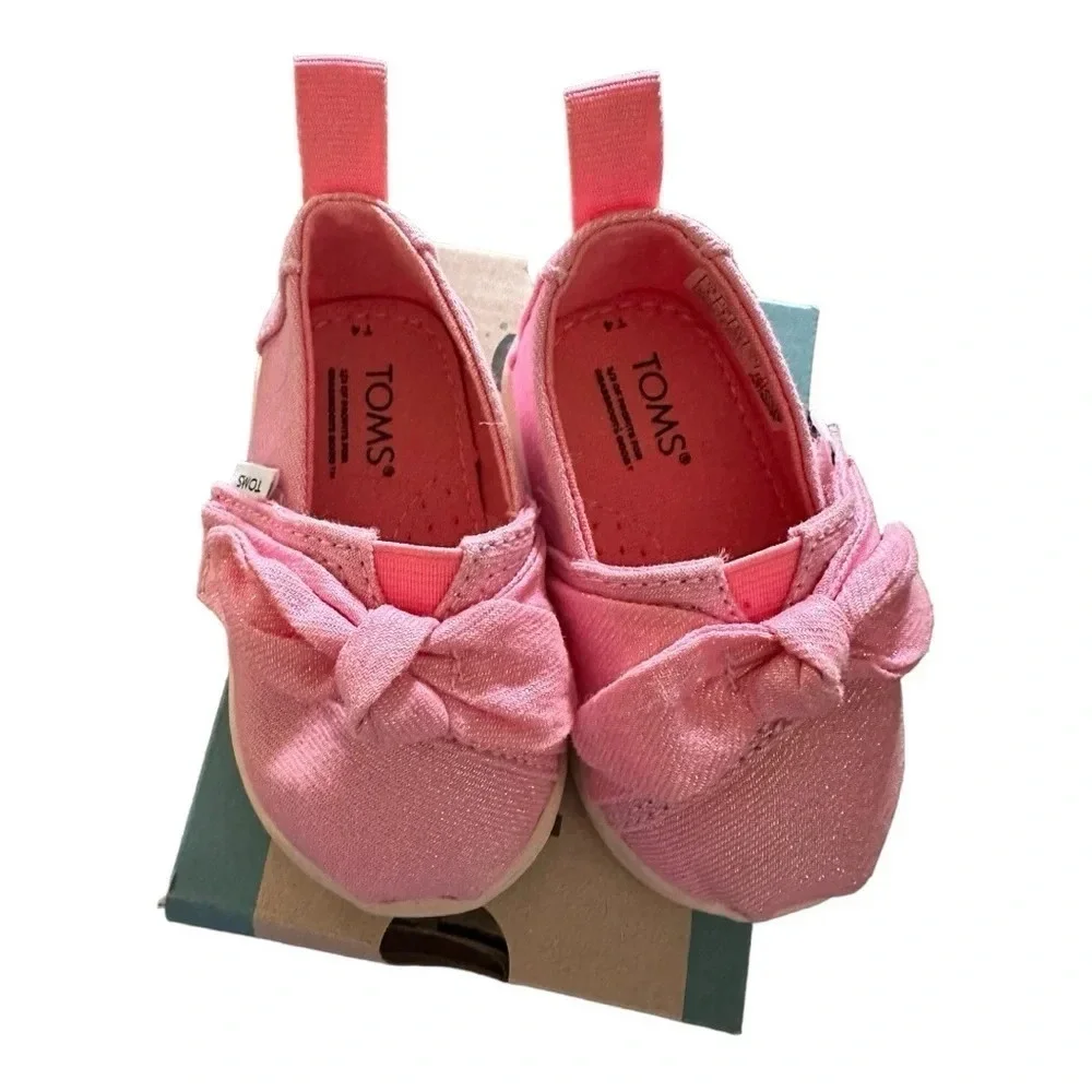 Toms put bow
