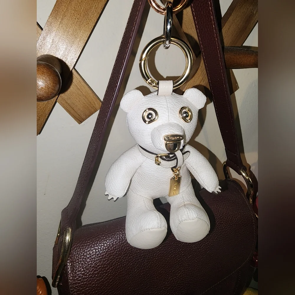 Coach signature white