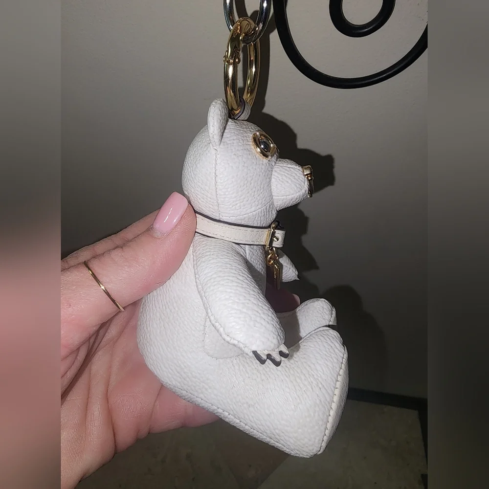 Coach signature white