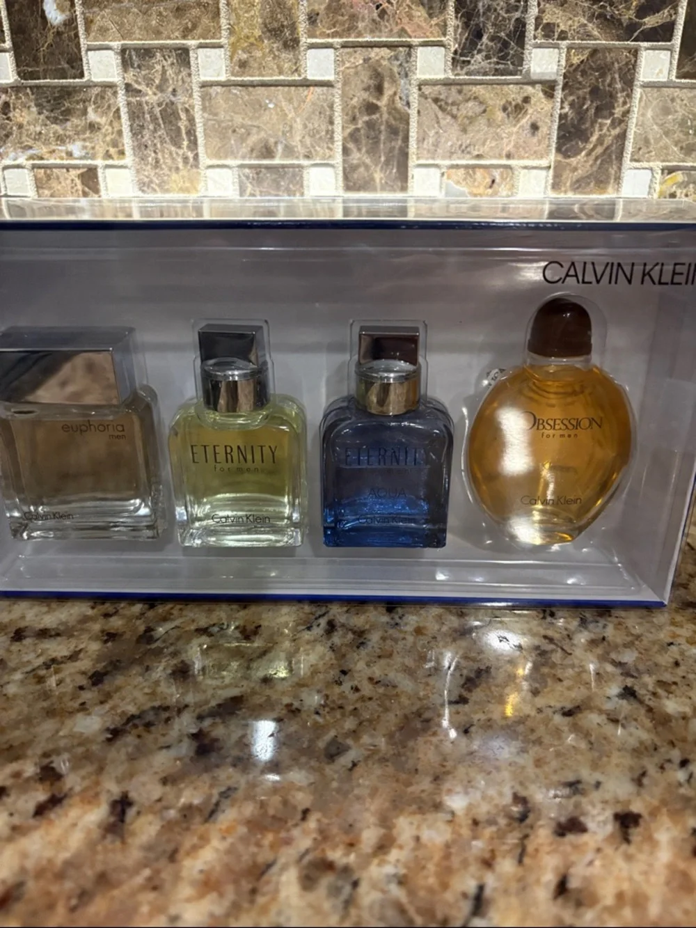 Calvin Klein Men's Mini Cologne Quartet -‎ Amber, Blue, Pale Yellow, Clear