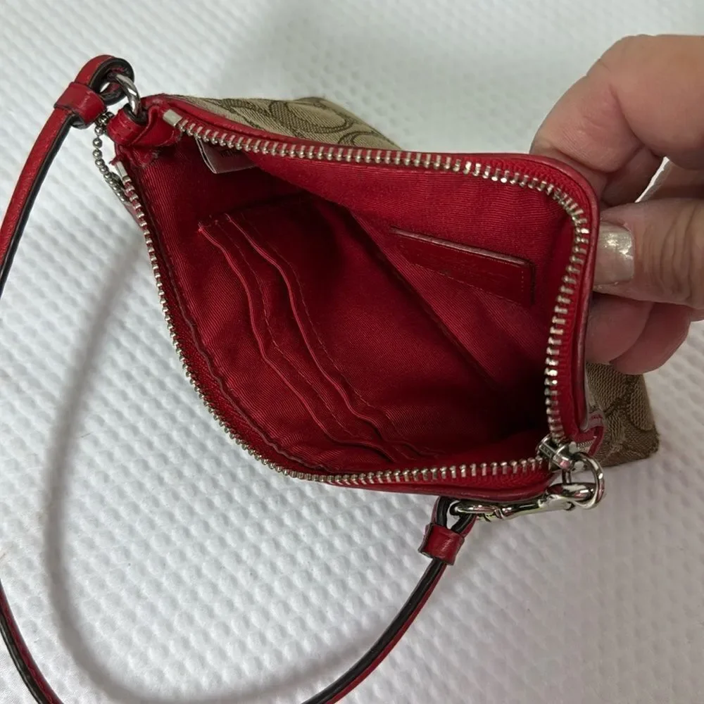 Coach tan and red Wristlet with Logo Pattern