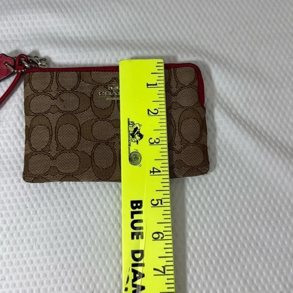 Coach tan and red Wristlet with Logo Pattern