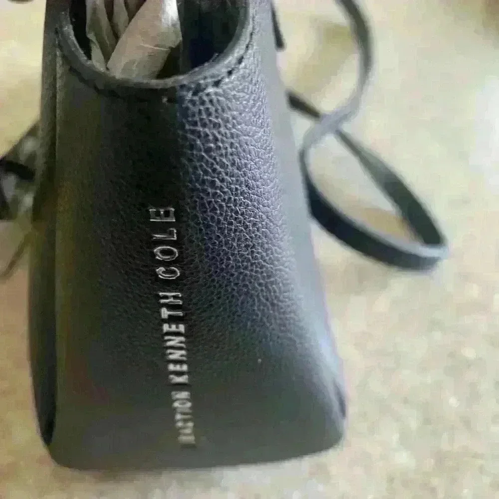 Kenneth Cole Reaction tags kenneth