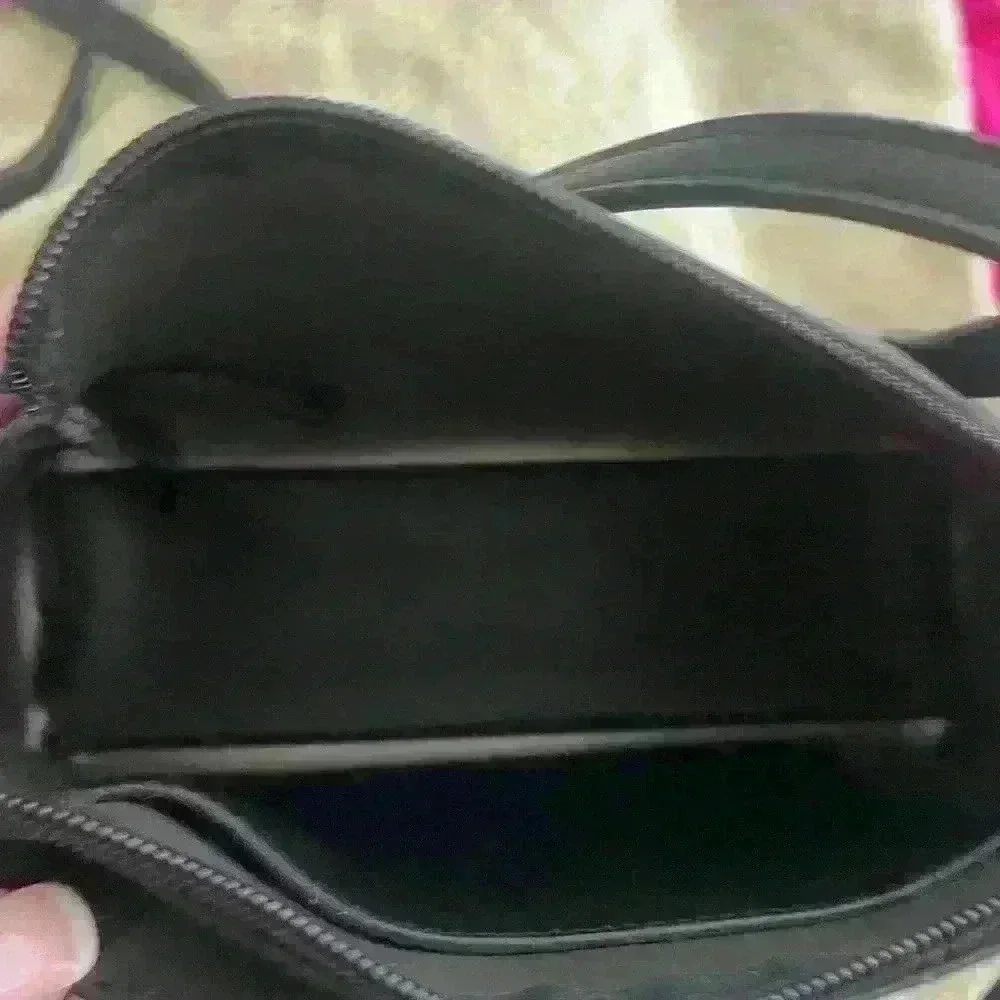 Kenneth Cole Reaction across purse inches