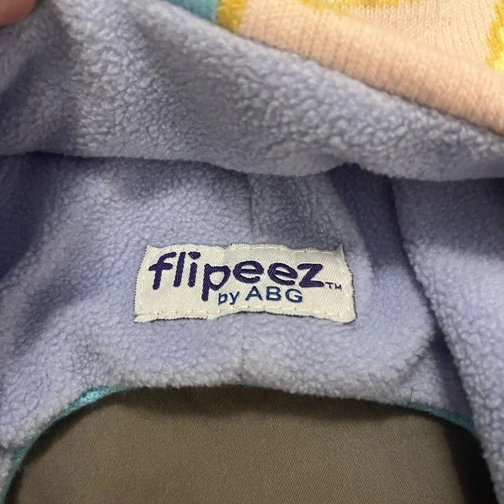 Flipeez by ABG Disney Frozen Elsa Interactive Knit Earflap Hat Blue Girls Beanie