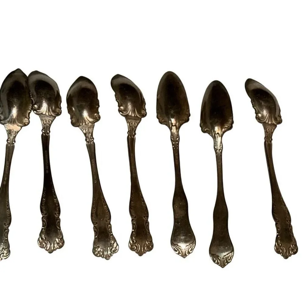 7 Vintage WM Rogers & Son AA Silver Grapefruit Spoon Set 6.5