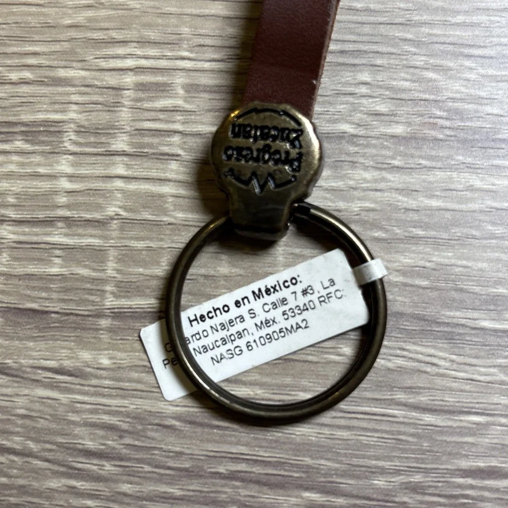 N/A brass keychain