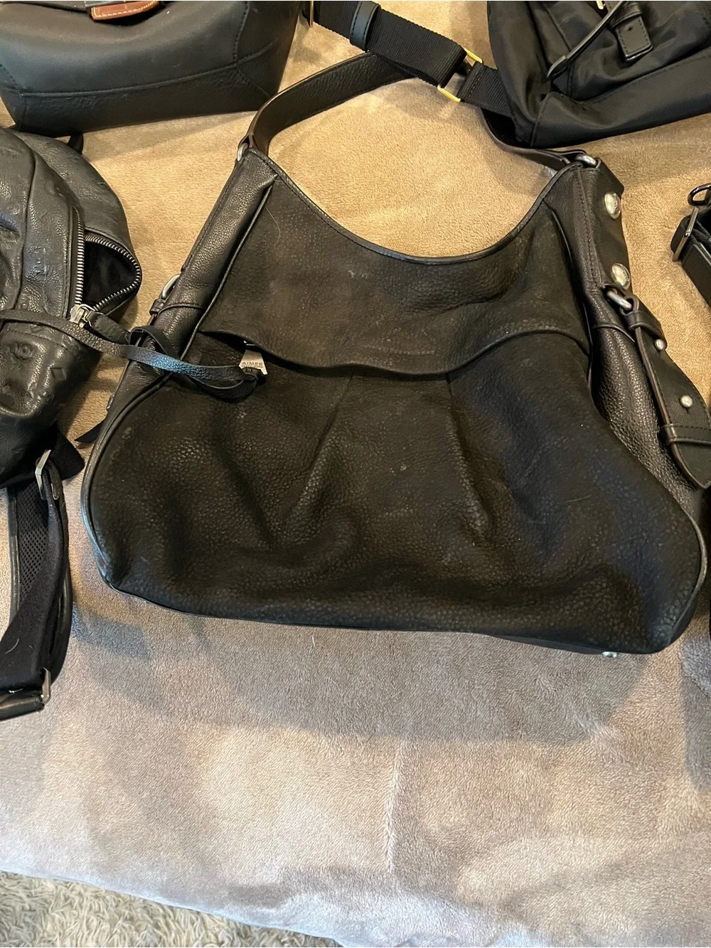 Tumi hands nylon use