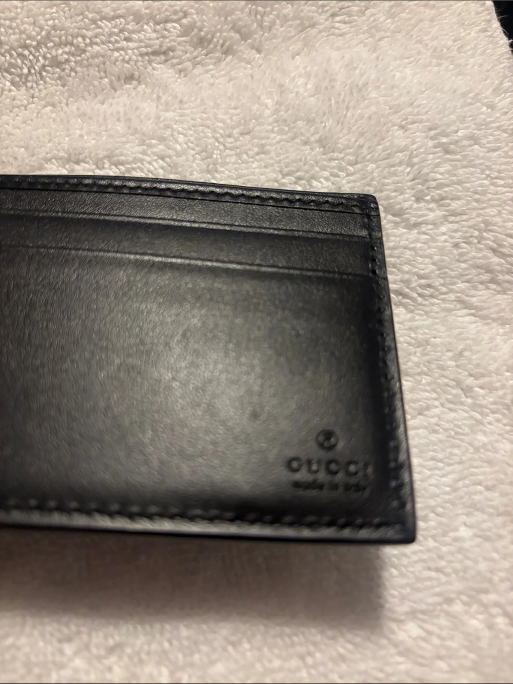 Gucci Black Perforated GG Embossed Leather Wallet
