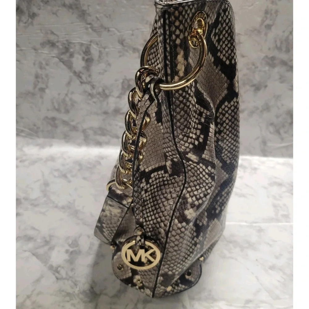 Michael Kors gold kors good