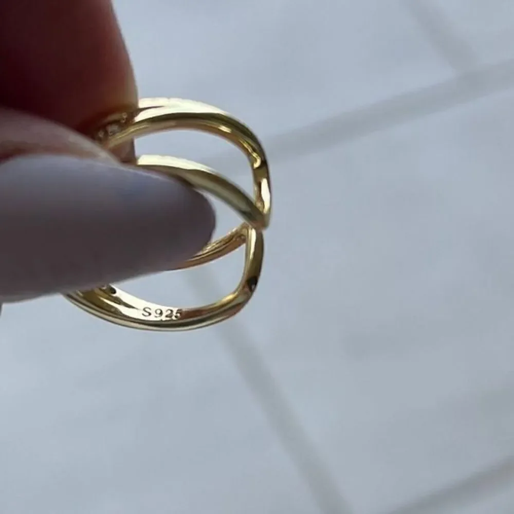 The Triple Bling Ring adjustable in 14k gold over 925 with cubic zirconia