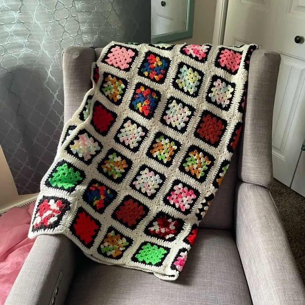 Colorful black/cream granny square blanket