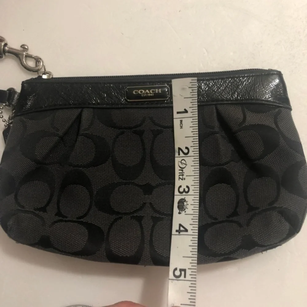 Coach black signature wristlet