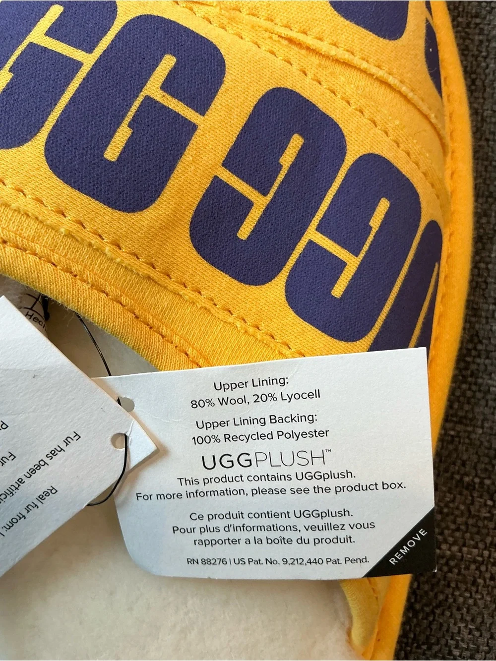 UGG White Shearling Slide with Yellow Logo