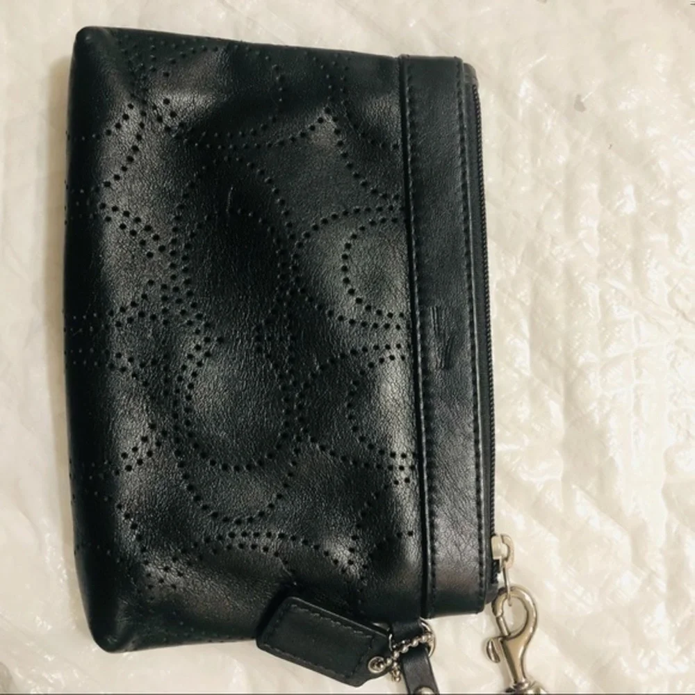 Coach signature perforated c wristlet bag