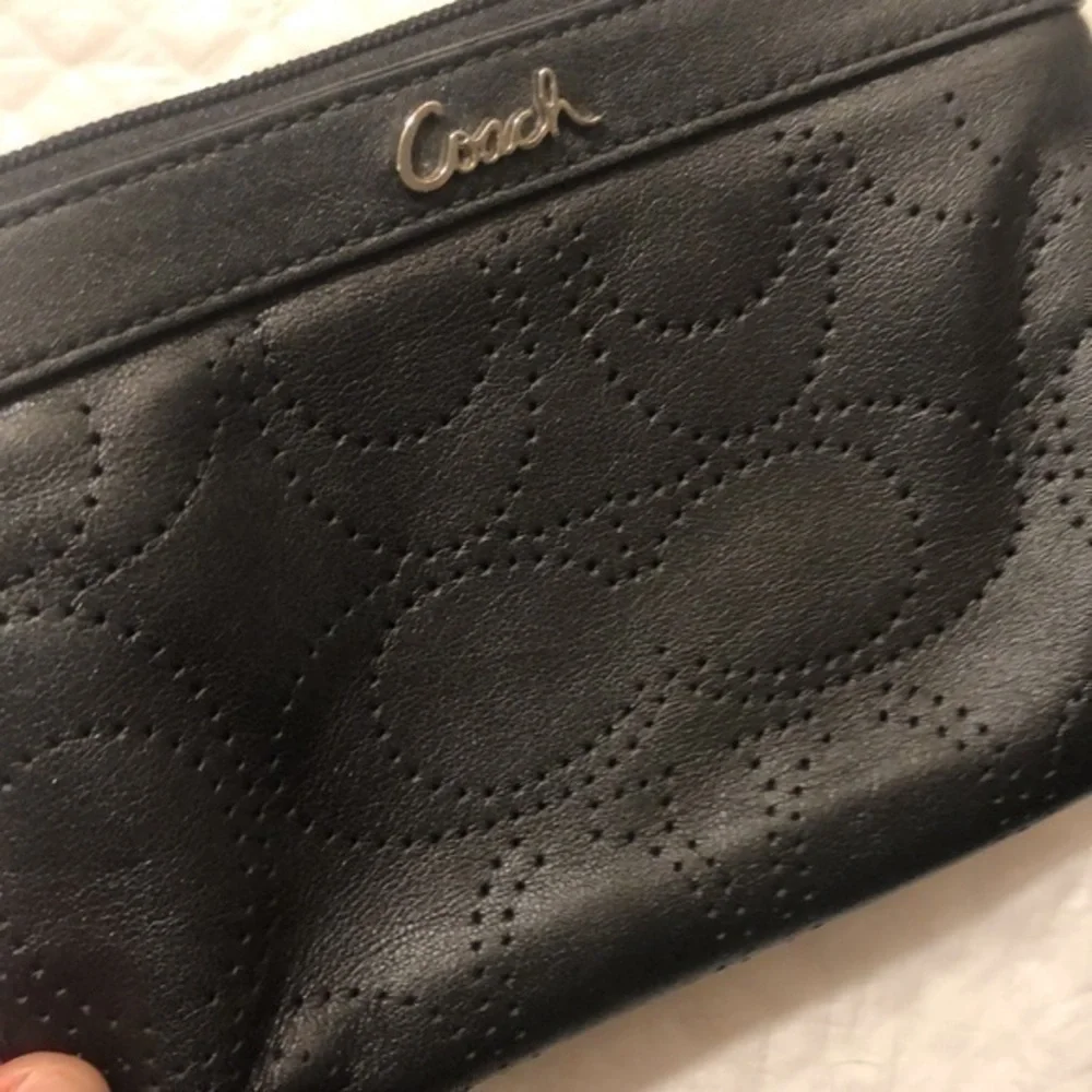 Coach signature perforated c wristlet bag