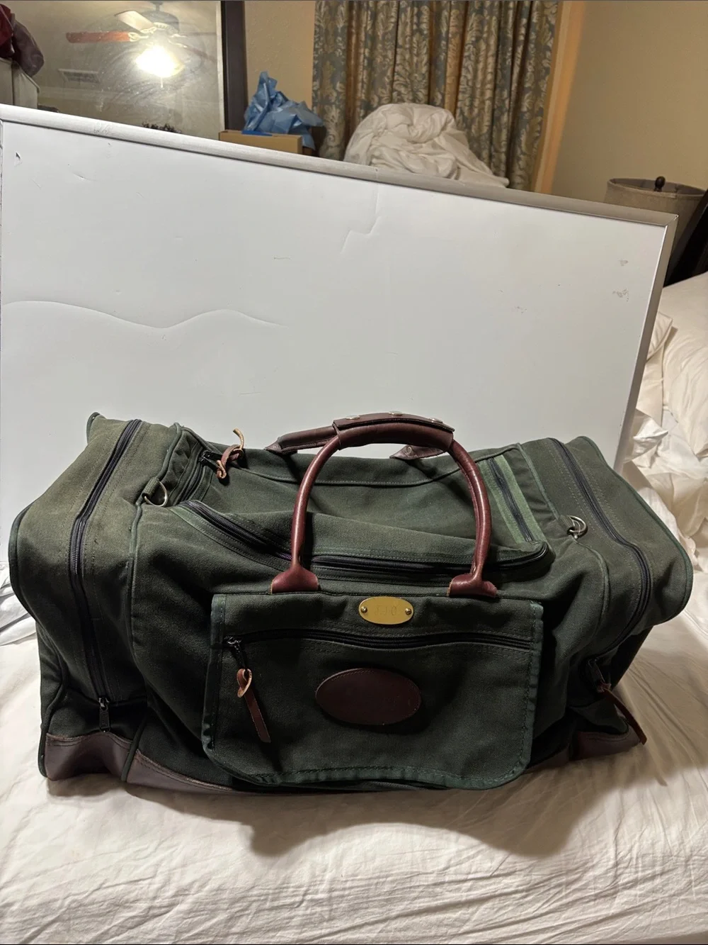 Orvis Dark Green Canvas Duffel with Brown Leather Trim. EUC