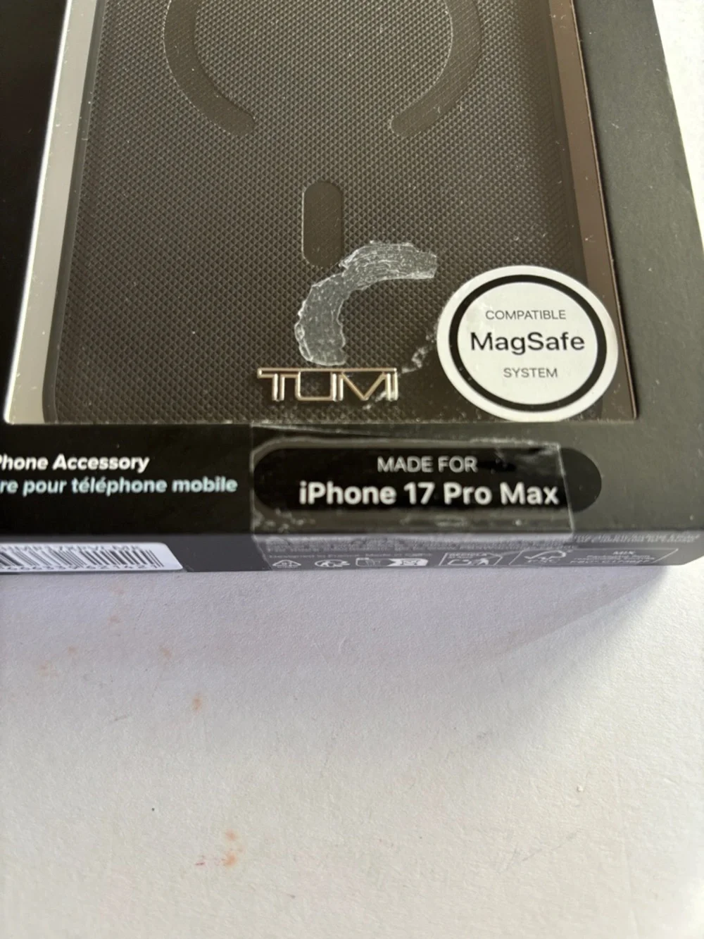 Tumi raised snap