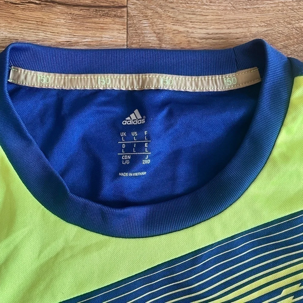 Adidas F-50 short sleeve training tee for men Color blue/yellow men size large