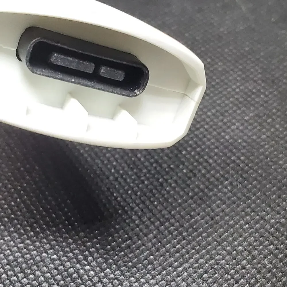 white adapter cable for the Xbox 360 console