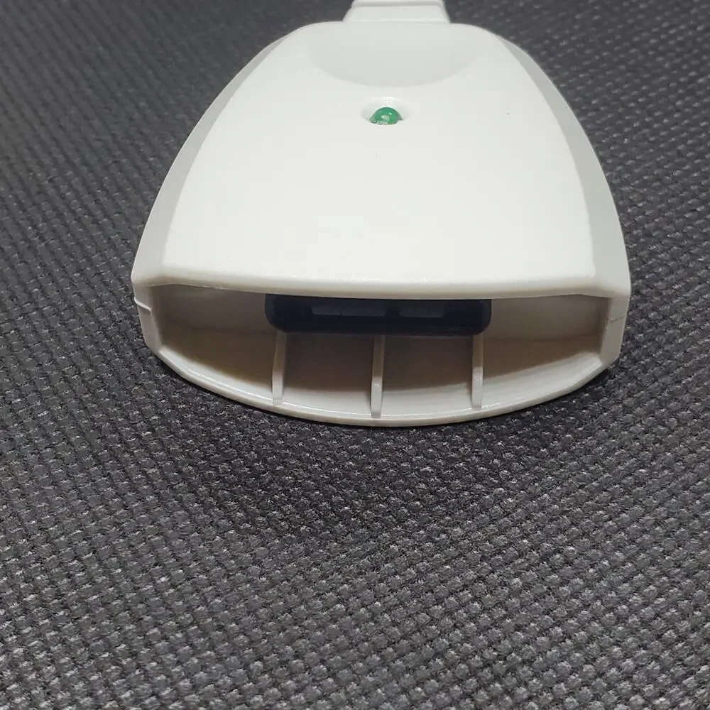 white adapter cable for the Xbox 360 console