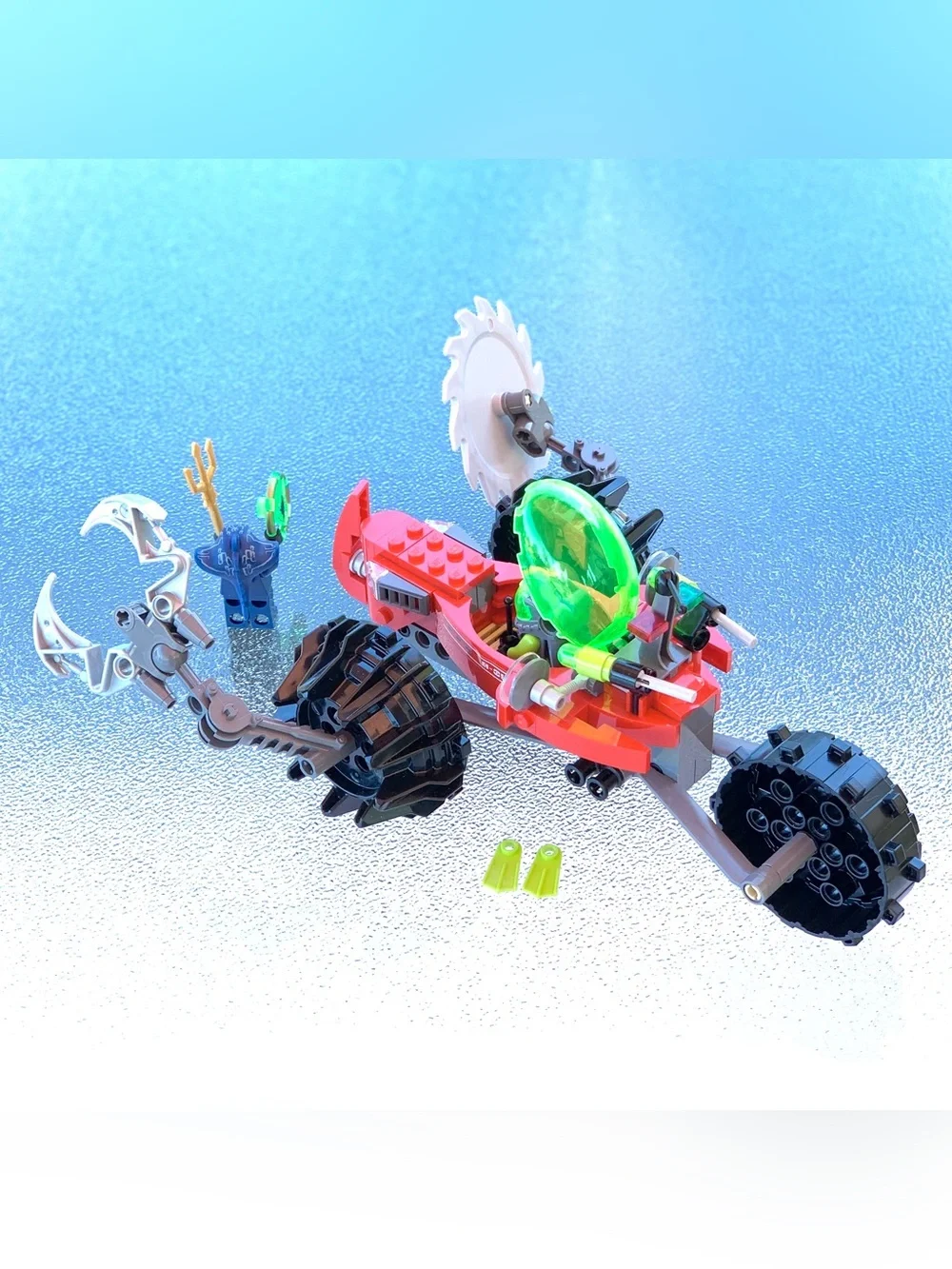 LEGO Atlantis Red Vehicle with Green Cockpit and Black Treads