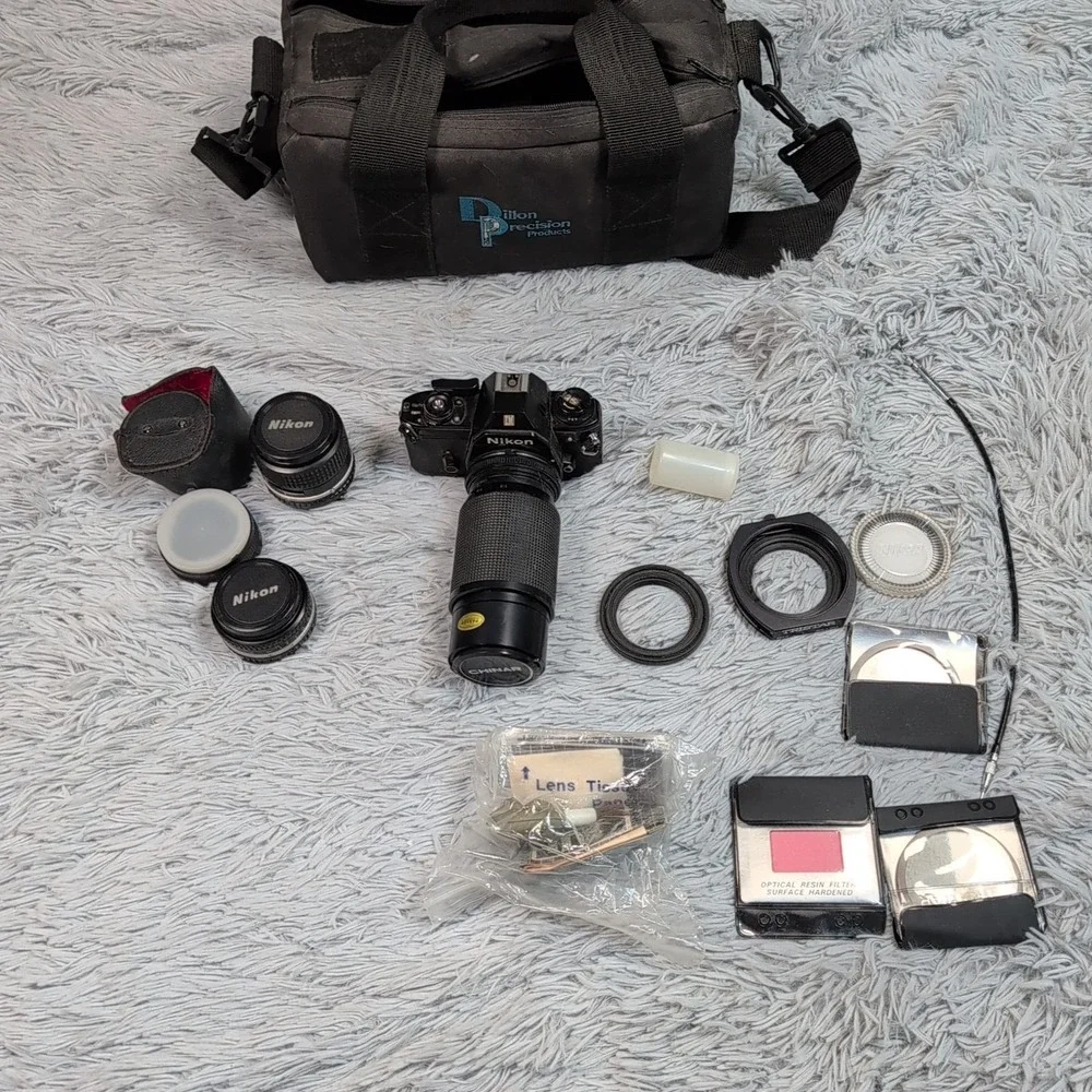 Vintage Nikon EM 35mm Film Camera Multi ‎ Lenses TriStar Filters Case Not Tested
