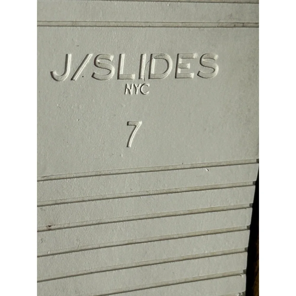 J/Slides Nada platform sneakers feature a pewter metallic suede upper Size 7