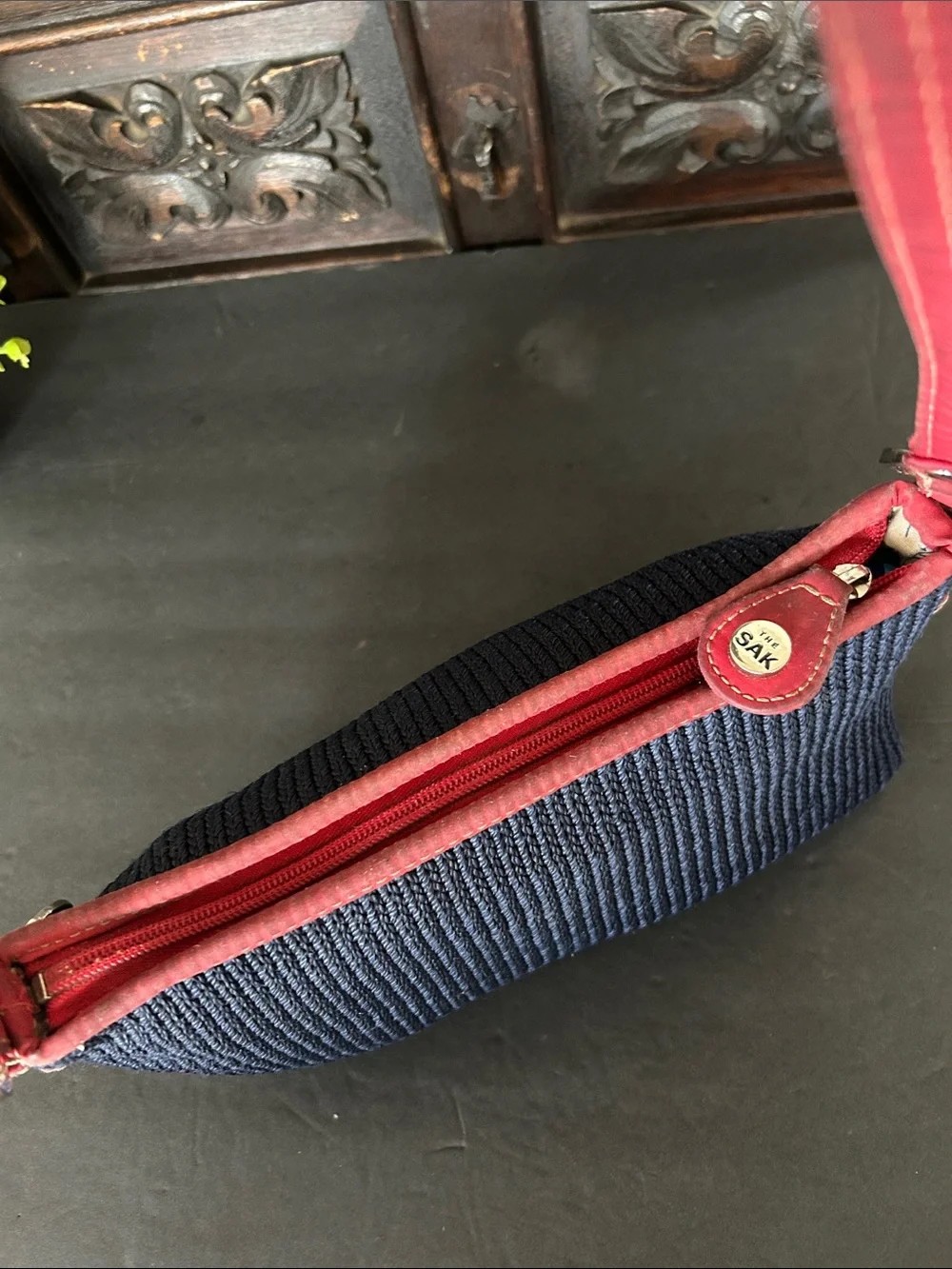 The Sak Navy Blue Crochet Woven Shoulder Bag with Red Trim