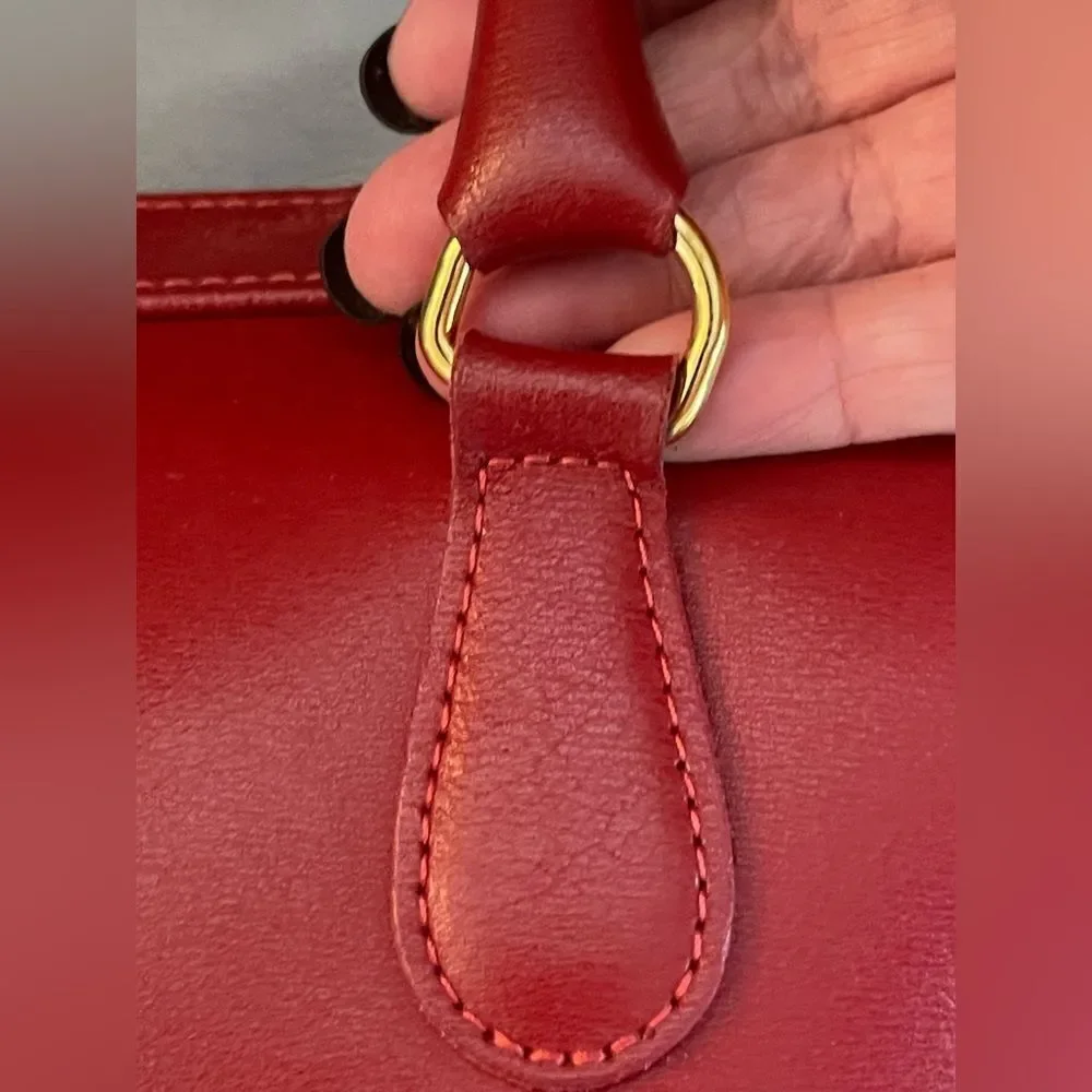 Vintage Longchamp Roseau Leather Bag in the color Bordeaux.