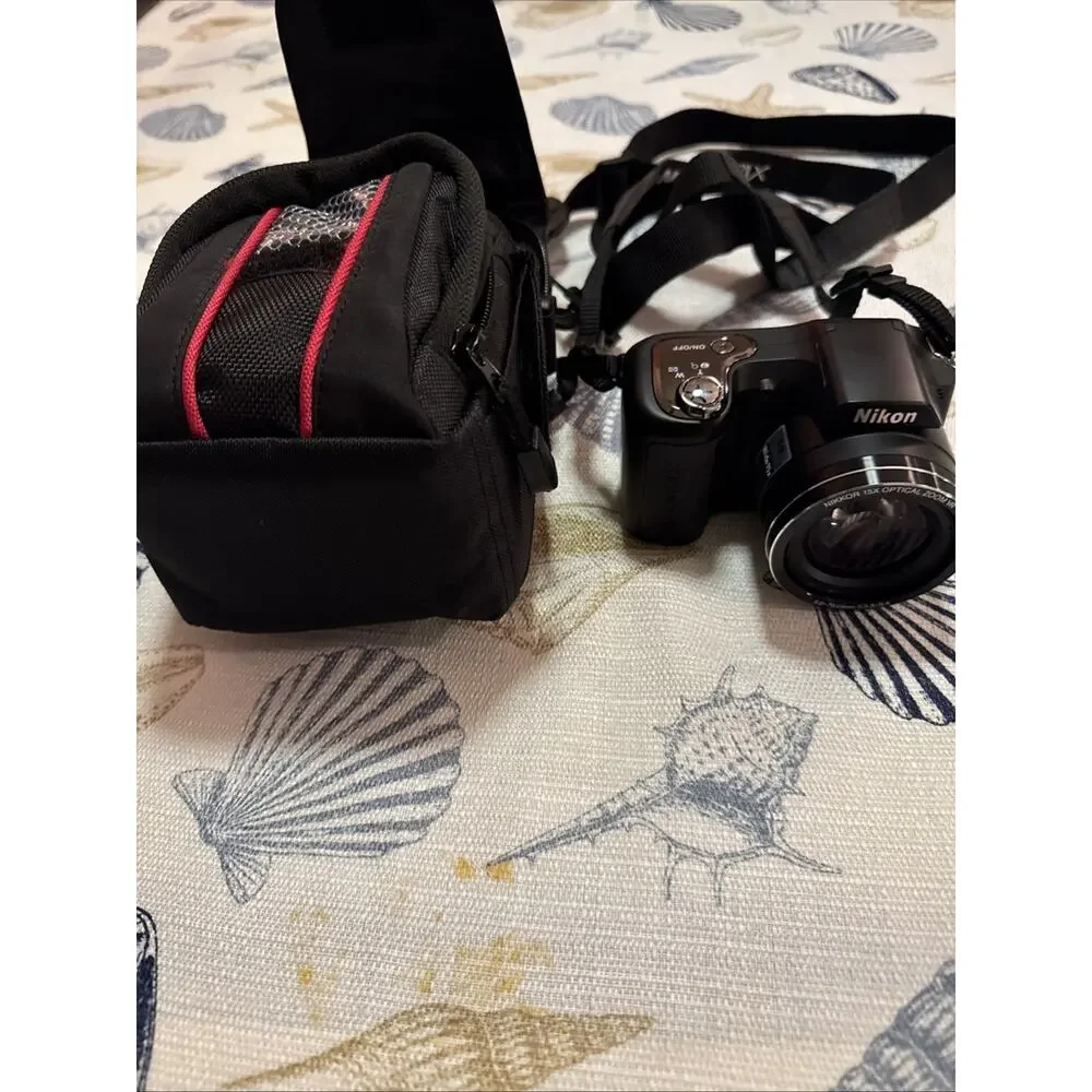 Nikon Black Camera with Matching Black Carry Case and Red Trim