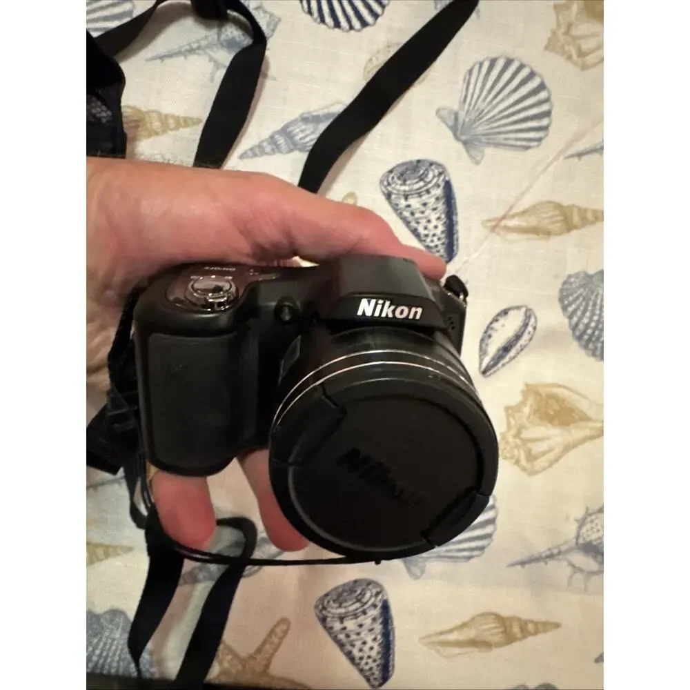 Nikon Black Camera with Matching Black Carry Case and Red Trim